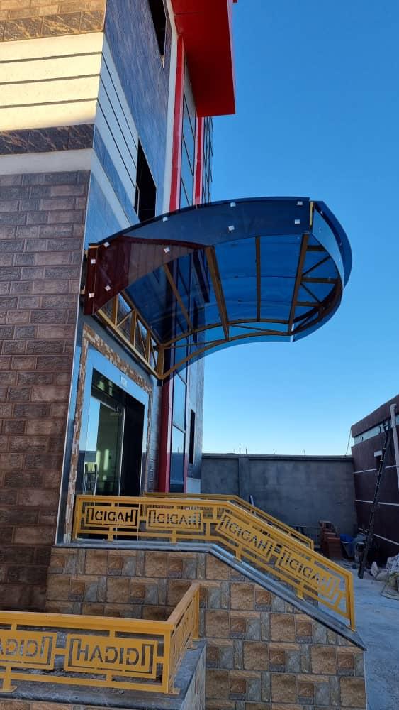 FutureIron fabricated entrance canopy and railing